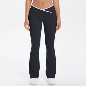 Close-up of high-waisted V-shaped cross waistband with white contrast piping on black yoga pants