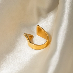 Detail of 18k gold plated stainless steel open ring with asymmetric geometric design