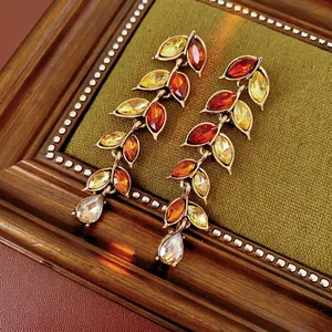 Boucles d'oreilles vintage en feuilles avec cristaux ambre et pendentif en goutte