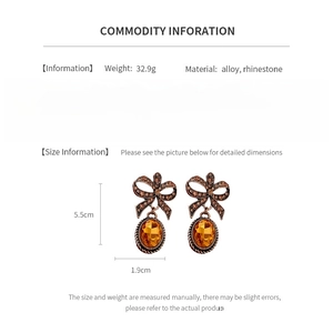Detailed product size guide for vintage bow earrings with alloy and rhinestone material