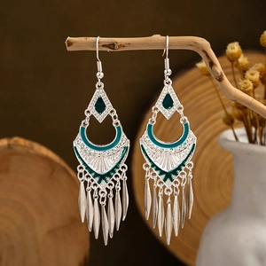 Ethnic bohemian long silver tassel earrings with dark green enamel and leaf charms