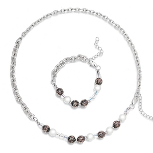 Parure collier couple sable doré lumineux avec perles étoilées noires et chaîne acier