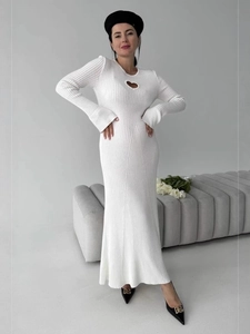 White knitted long sleeve maxi dress with heart cutout and Audrey Hepburn style flare sleeves