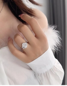 Close-up of S925 sterling silver bridal ring set with sparkling round carbon diamonds