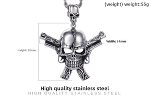 Macro detail of gothic skull pendant with crossed guns in vintage stainless steel