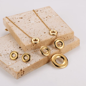 Golden 304 stainless steel jewelry set with Greek key pattern rings on stone