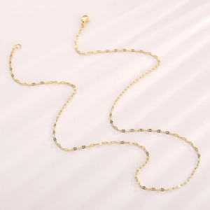 Elegante gouden lippenketting van roestvrij staal met een minimalistische glanzende look