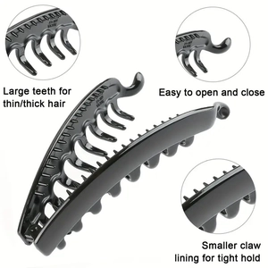 Detail view of 13cm black banana clip featuring anti-slip teeth and glossy finish