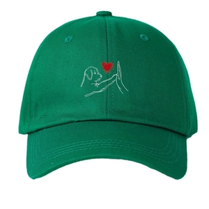 Green baseball cap with embroidered dog and heart design for outdoor casual sun protection