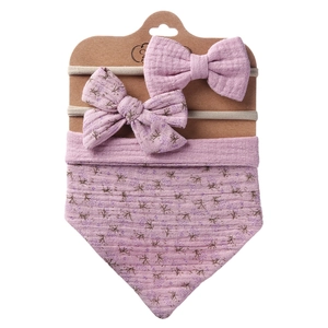 Close-up of baby lavender cotton gauze floral bib and headband set on display card