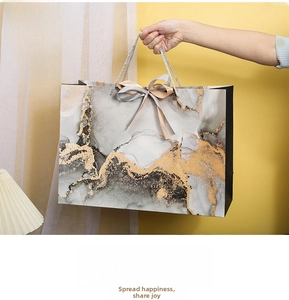 Extra large marble texture paper gift bag with silk bow and grey nylon handles 42x15x30cm