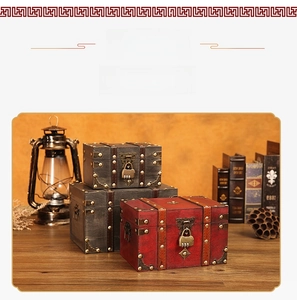Detail of vintage wooden storage boxes with metal corners and retro combination lock