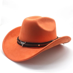 Close-up of orange suede cowboy hat featuring a silver bull skull on a studded leather band
