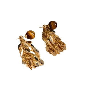 Elegant gold leaf tassel earrings with brown resin beads in a vintage 45-degree view