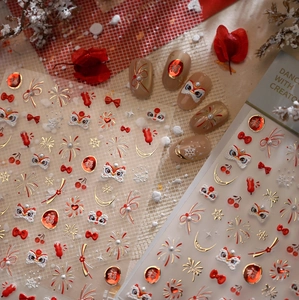 Detailed view of 3D embossed New Year nail art stickers with lion dance and fireworks
