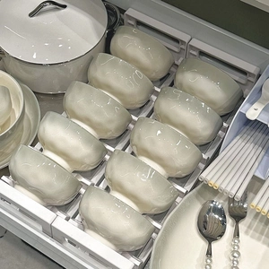 Nordic minimalist ceramic bowl set in pearl white glaze stored in drawer organizer