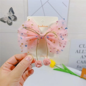Barrette nœud en tulle rose avec pois pailletés colorés et pompons pour filles