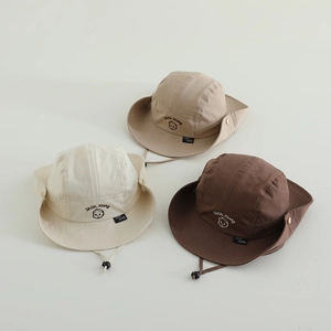 Detail of kids outdoor sun hats with bear embroidery and adjustable windproof straps
