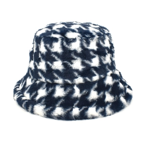 Detail of navy blue houndstooth plush bucket hat featuring thick warm winter fabric