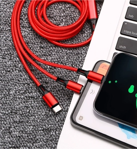 Detail of red nylon braided 3-in-1 multi-charging cable for Type-C, Lightning and Micro-USB