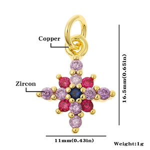 Detail of copper cross pendant with zircon stones and product size measurements
