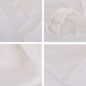 Detailed view of white velvet tote bag showing stitching and soft premium fabric texture