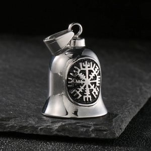 Macro view of Viking Vegvisir compass bell pendant in polished stainless steel