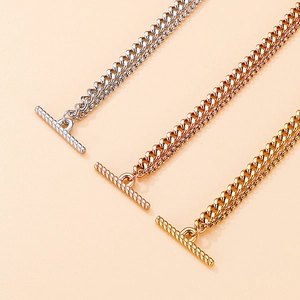 Double layered Cuban chain necklace with heart pendant and OT buckle in three metallic colors