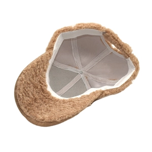 Detail view of the warm camel plush baseball cap with soft lining and reinforced seams
