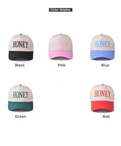 Front view display of various two-tone baseball caps with Honey letter embroidery