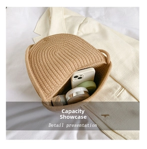 Detail presentation showing large capacity of the beige woven straw bucket bag