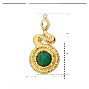 Macro view of gold snake pendant with green natural stone and dimensions measurement