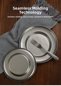 Close-up of matte stainless steel pasta plate showing seamless one-piece molding process