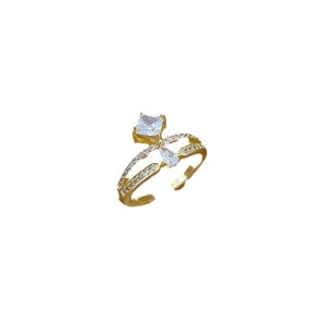 Adjustable gold crown ring featuring square and teardrop-shaped clear gemstones