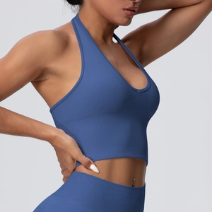 Close-up of royal blue seamless ribbed yoga bra with halter neck and open back design