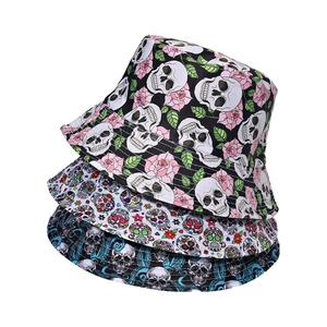 Three-piece skull bucket hat set featuring rose, floral, and sugar skull prints