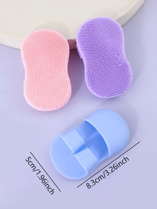 Detail of macaron silicone facial brushes showing soft bristles and finger handle design