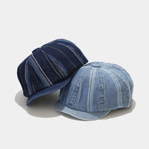 Retro denim newsboy caps with striped stitching in navy and light blue washes