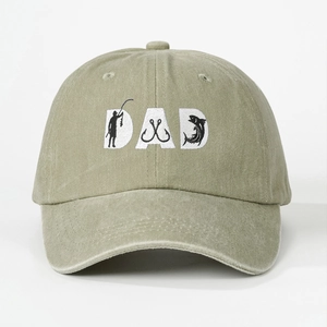 Detail of light khaki washed baseball cap showing embroidered DAD fishing theme text