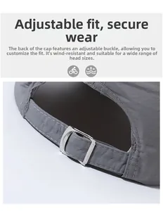 Close-up of adjustable metal buckle on gray sun hat for outdoor sports fit