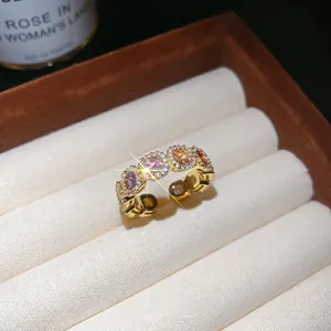 14k gold plated open ring featuring colorful zircon stones with sparkling light effects