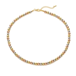 Elegant adjustable necklace with gold, silver, and rose gold metallic beads in a round display