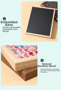 Detailed view of natural bamboo ring display tray with pink velvet slots for jewelry