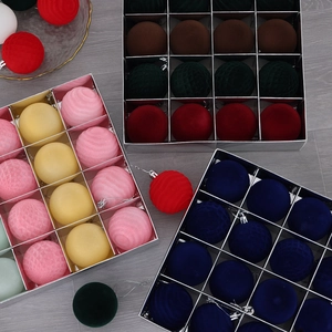 16-pack of 6cm flocked Christmas balls with textured patterns in a silver storage box