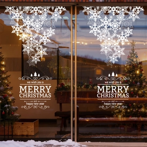 White snowflake Christmas window decals with Merry Christmas text for festive glass decoration