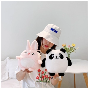Detail view of plush panda and bunny crossbody bags with metal chain straps for kids