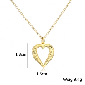 Detailed view of 18K gold heart pendant with angel wings dimensions and weight 4g