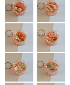 Macro view of six miniature noodle bowl keychains with realistic toppings and metal rings