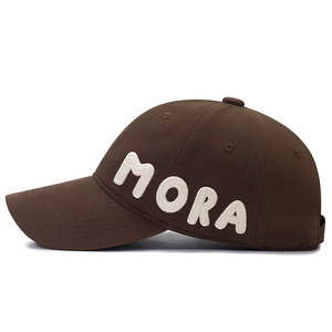 Brown cotton baseball cap with white 3D MORA embroidery on a white background