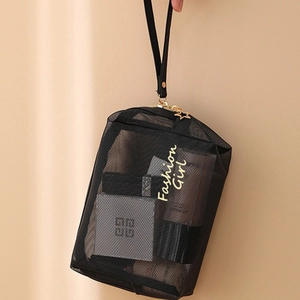 Portable black mesh cosmetic bag with gold Fashion Girl lettering and star zipper